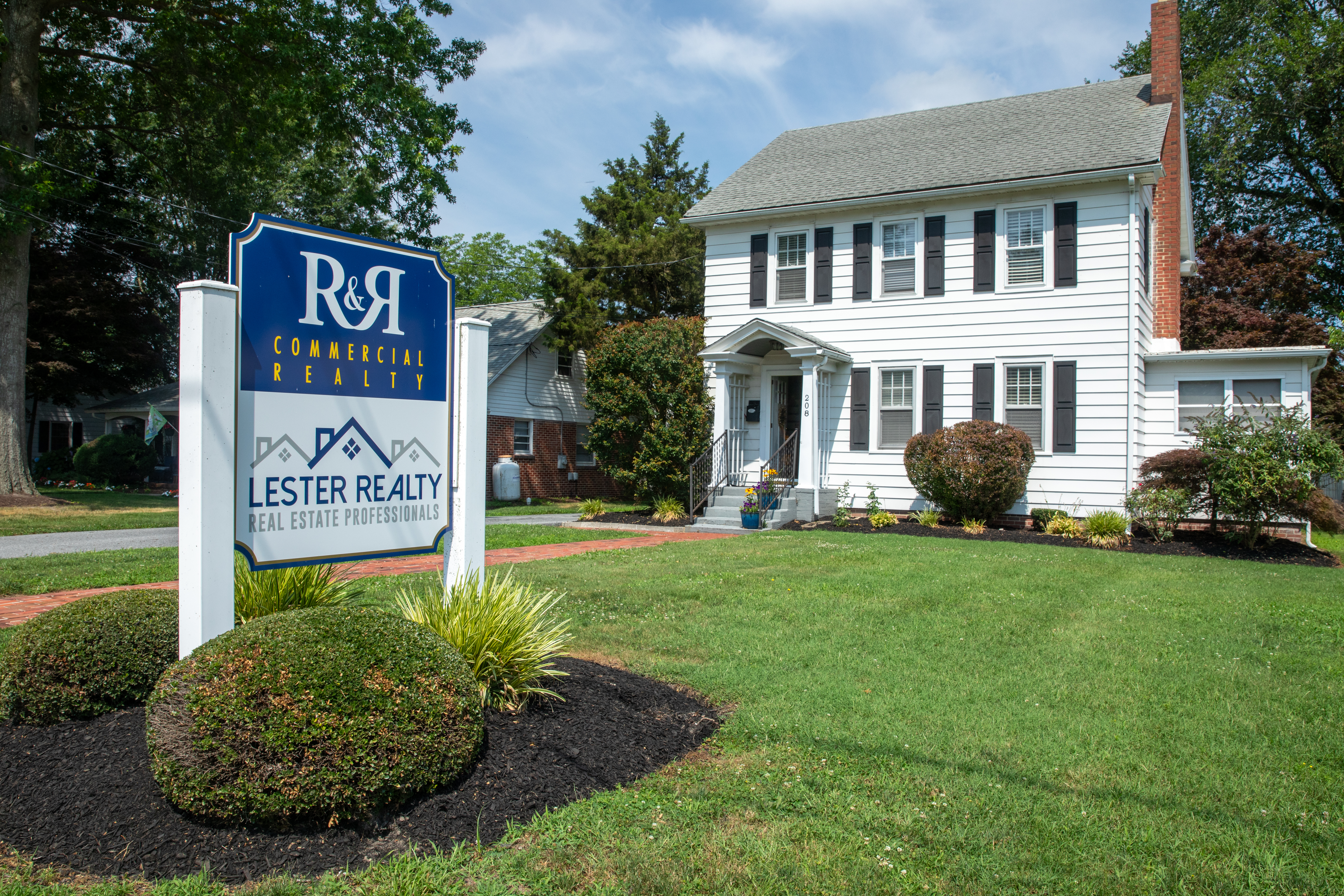 Exterior of the Keith Walpole Group office with new signage installed in 2025 at R&R Commercial Realty in Georgetown, Delaware